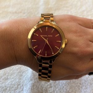 Woman’s Gold/RoseGold Michael Kors Watch